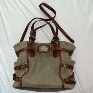 Michael Kors Handbag with brown leather strap.